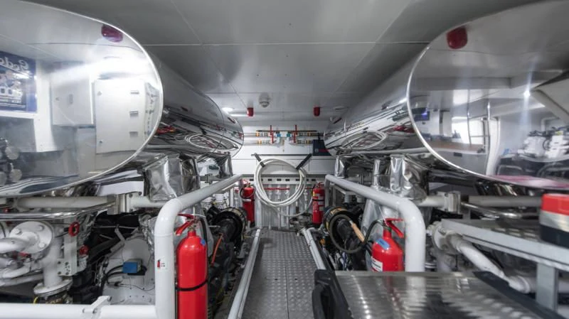 a large white machine in a room aboard NO SAUCE Yacht for Sale