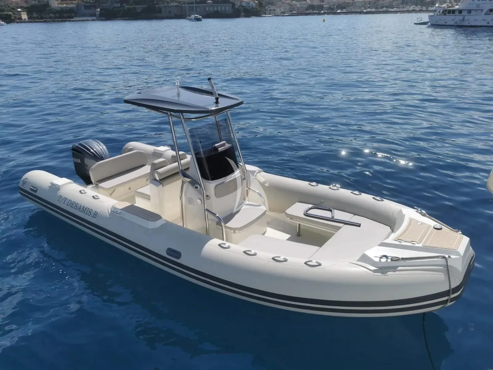 a white boat in the water aboard DESAMIS B Yacht for Sale