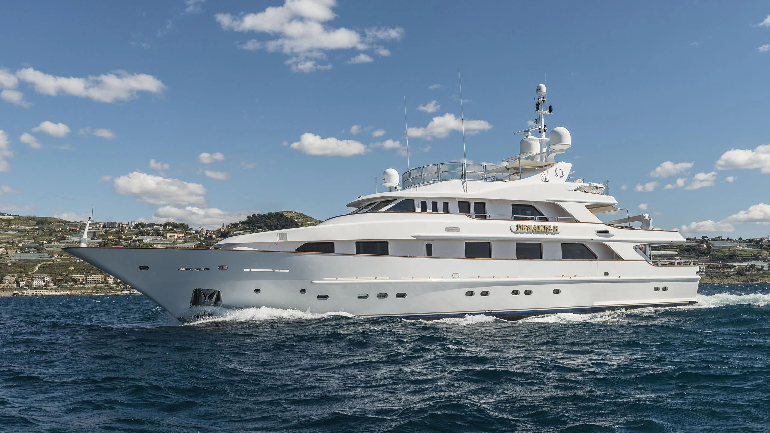 a large white boat aboard DESAMIS B Yacht for Sale
