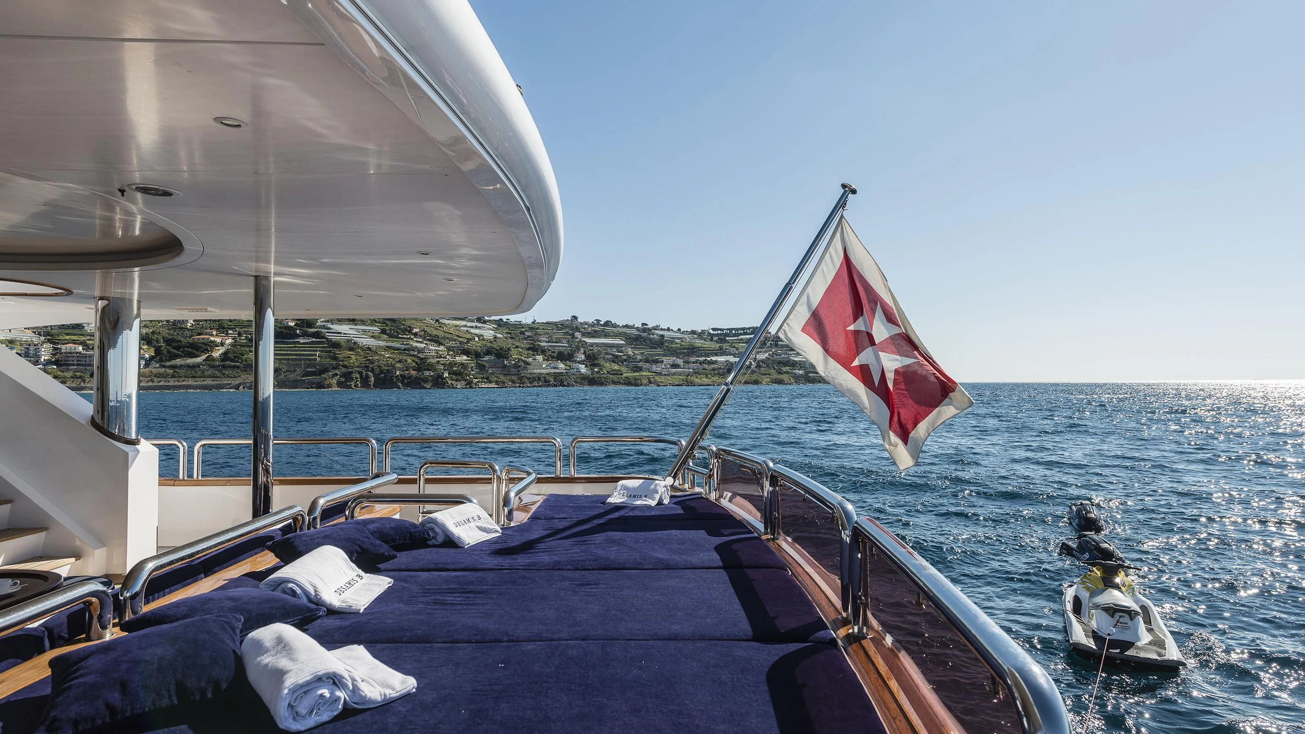 a flag on a boat aboard DESAMIS B Yacht for Sale