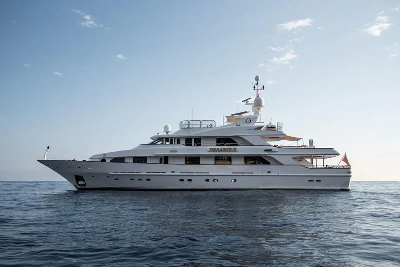 a white yacht on the water aboard DESAMIS B Yacht for Sale