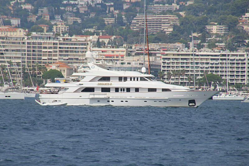 a white yacht in the water aboard DESAMIS B Yacht for Sale