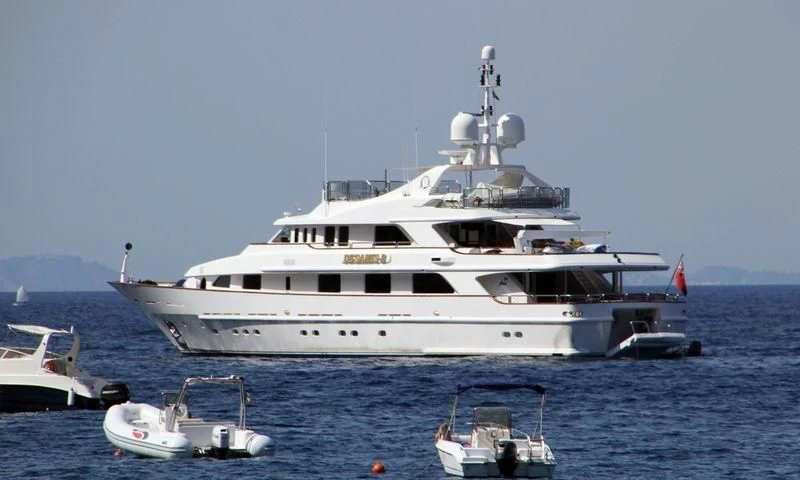 a large white boat in the water aboard DESAMIS B Yacht for Sale