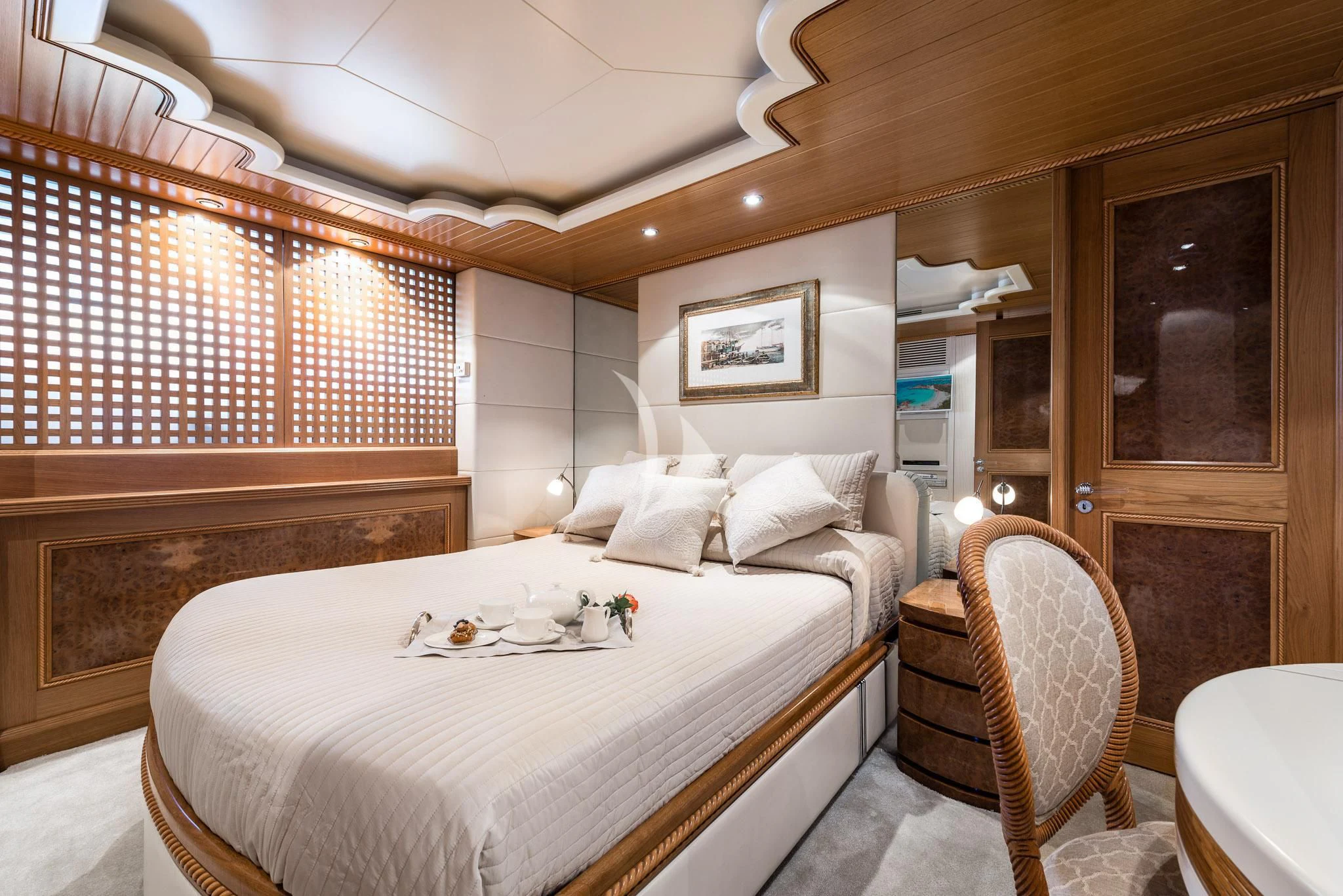 a bed with a white sheet aboard DESAMIS B Yacht for Sale