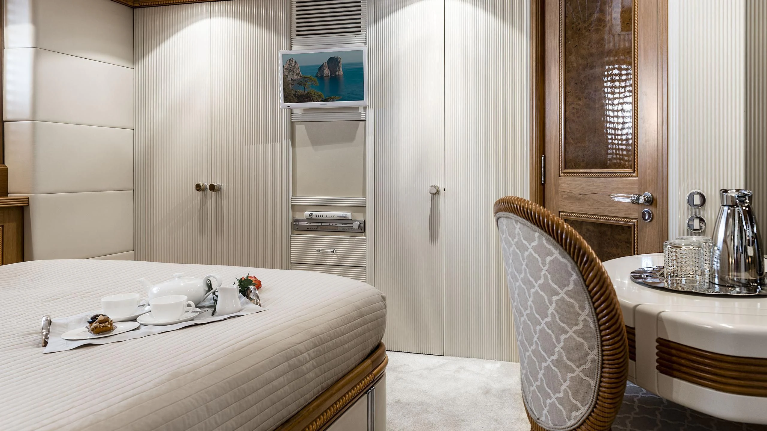 a table with a chair and a sink in a room aboard DESAMIS B Yacht for Sale