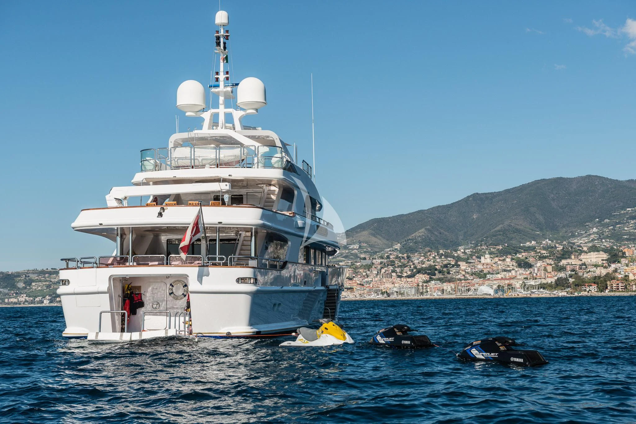 a large white boat in the water aboard DESAMIS B Yacht for Sale