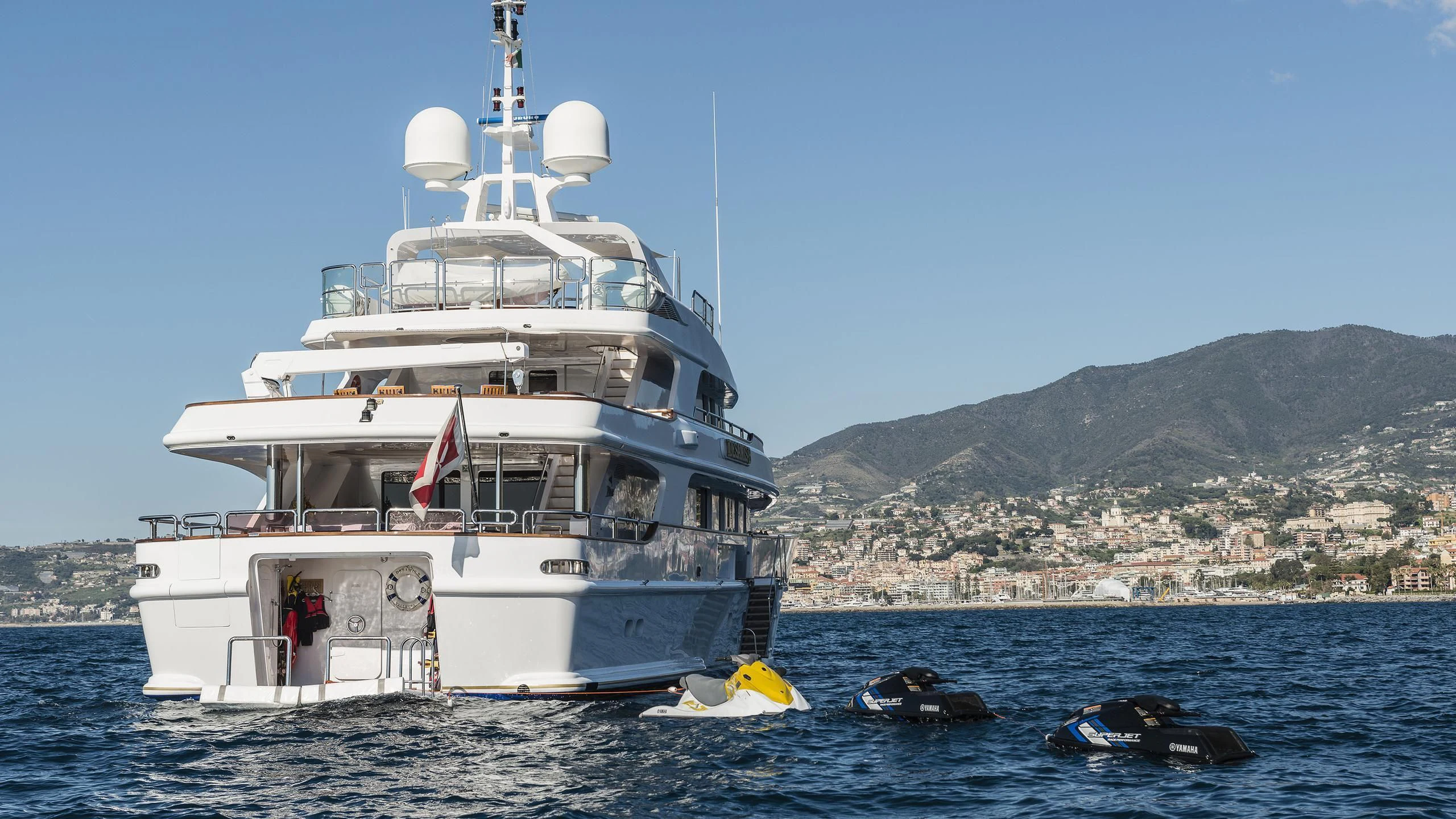 a large white ship in the water aboard DESAMIS B Yacht for Sale