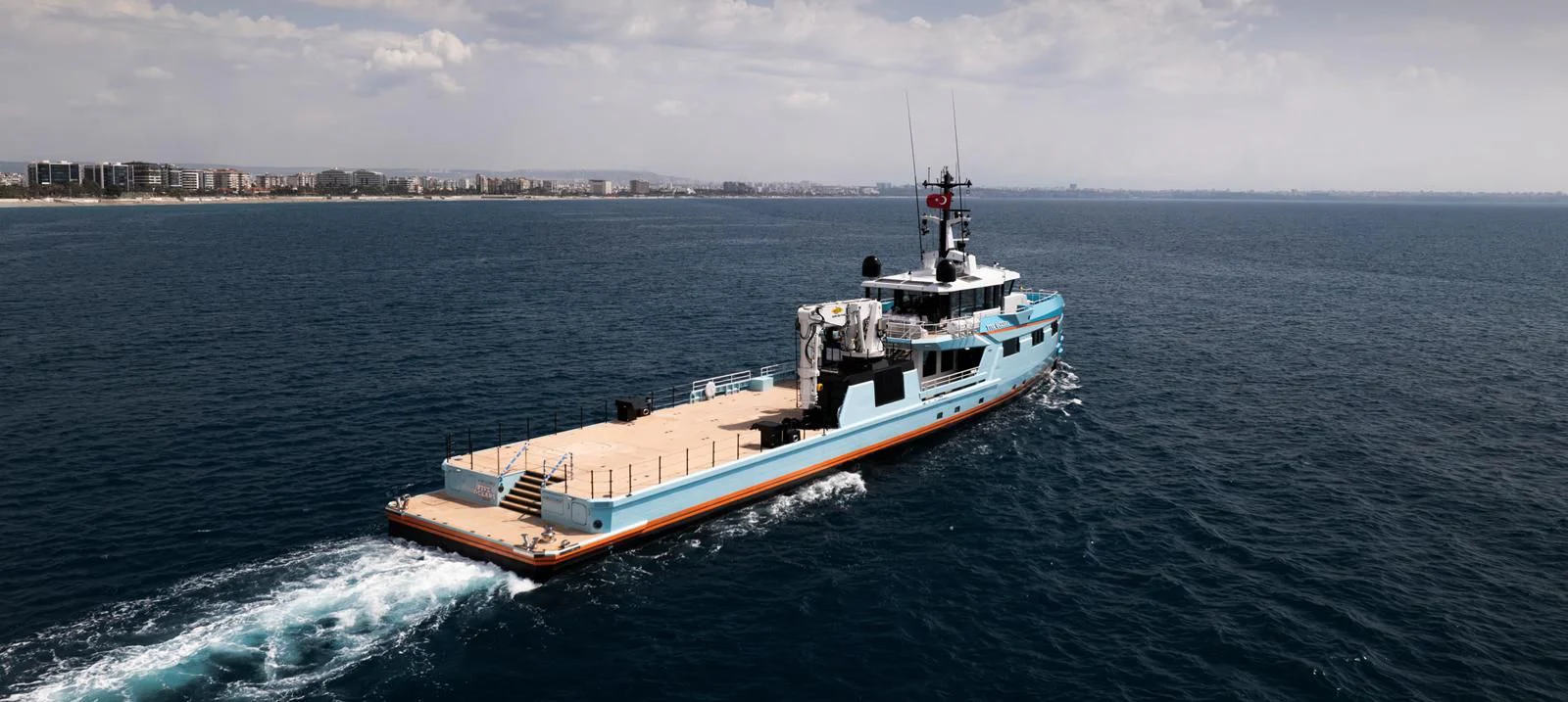 a ship in the water aboard FIVE OCEANS Yacht for Sale