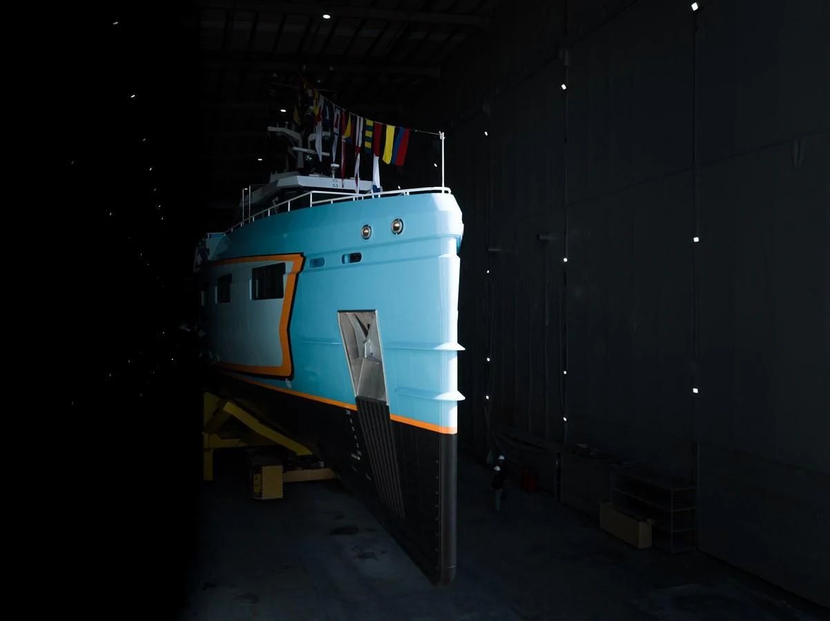 a large boat in a building aboard FIVE OCEANS Yacht for Sale