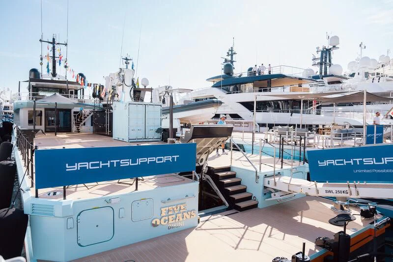 a large ship docked aboard FIVE OCEANS Yacht for Sale