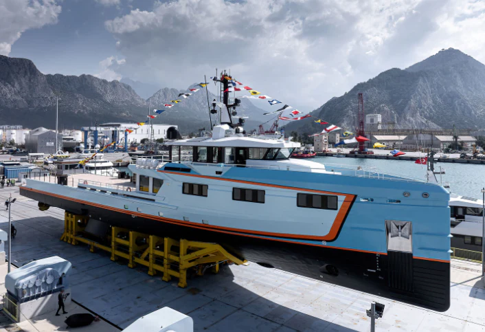 a boat docked at a pier aboard FIVE OCEANS Yacht for Sale