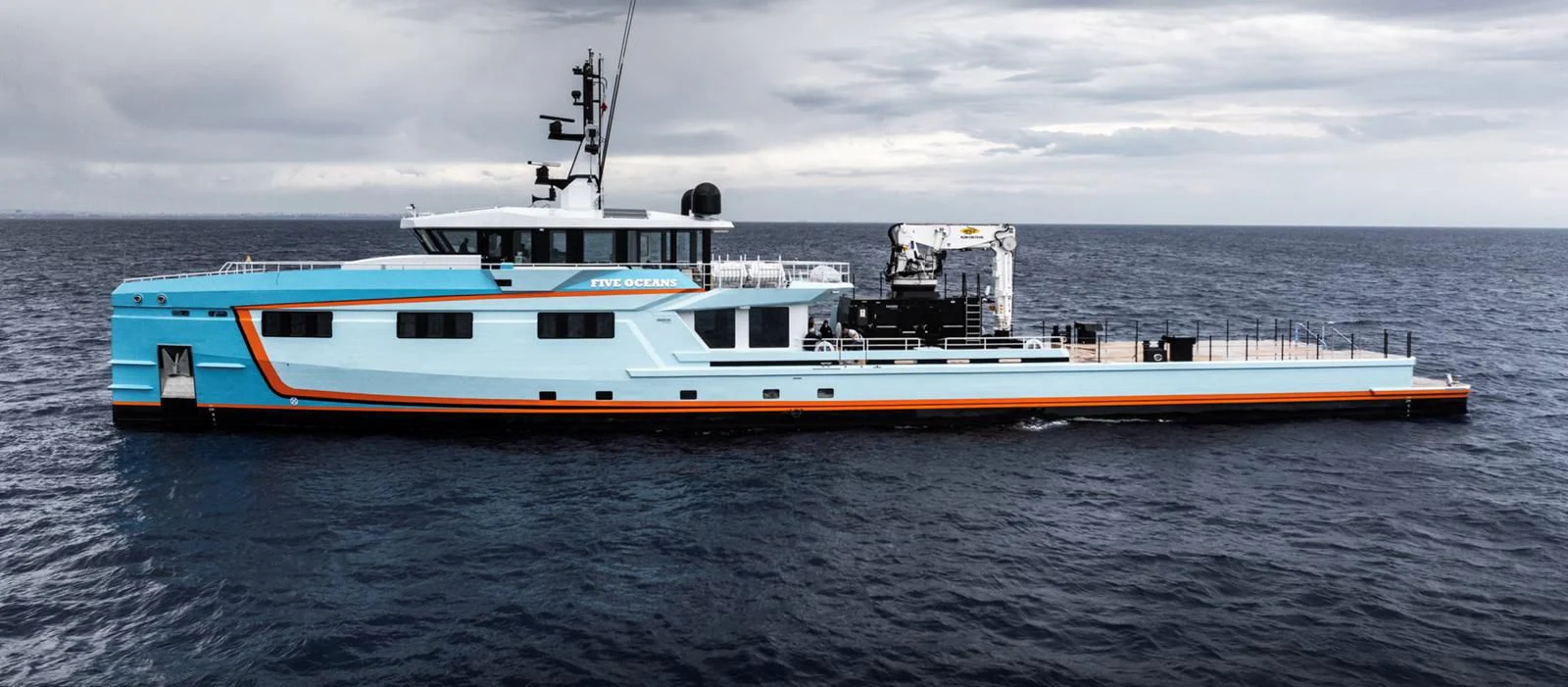 a boat in the water aboard FIVE OCEANS Yacht for Sale