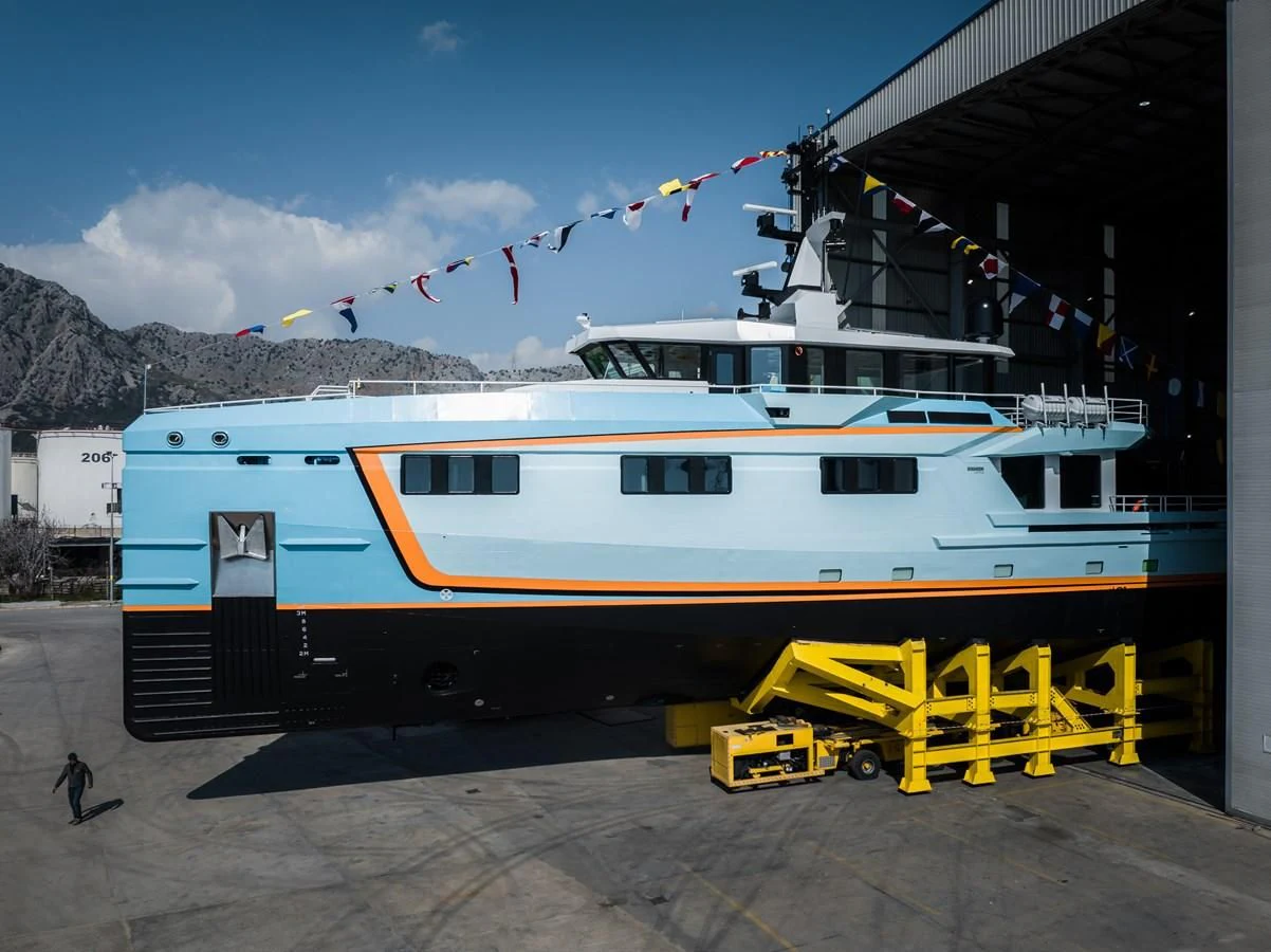 a boat docked at a pier aboard FIVE OCEANS Yacht for Sale