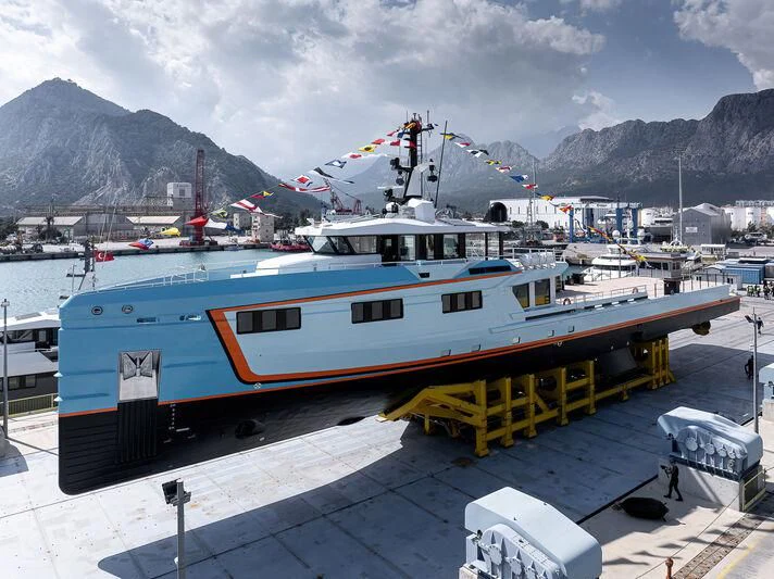 a boat docked at a pier aboard FIVE OCEANS Yacht for Sale