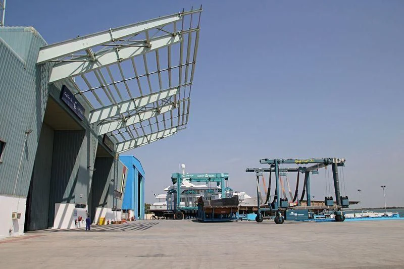 a large building with a crane aboard DANADIA Yacht for Sale