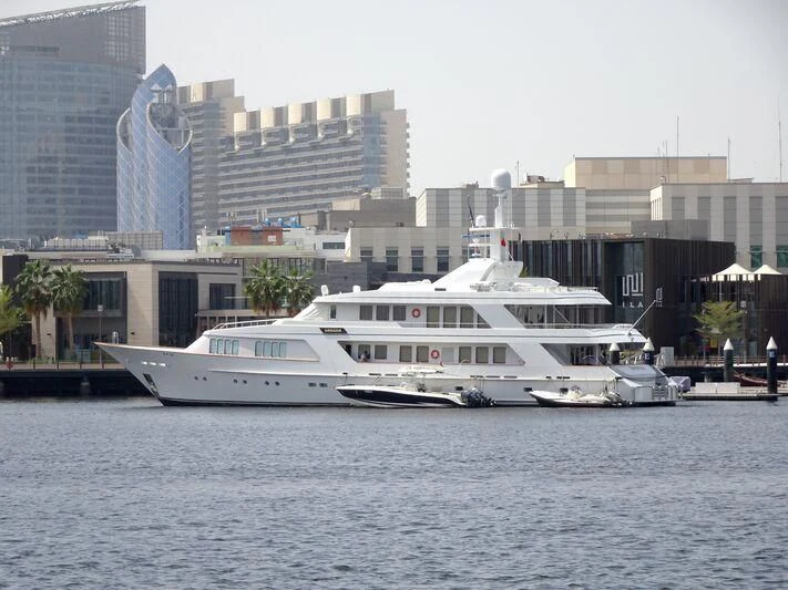 a white boat in the water aboard DANADIA Yacht for Sale