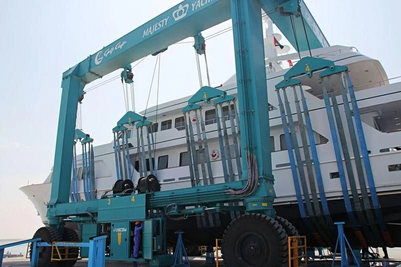 a large truck with a crane aboard DANADIA Yacht for Sale