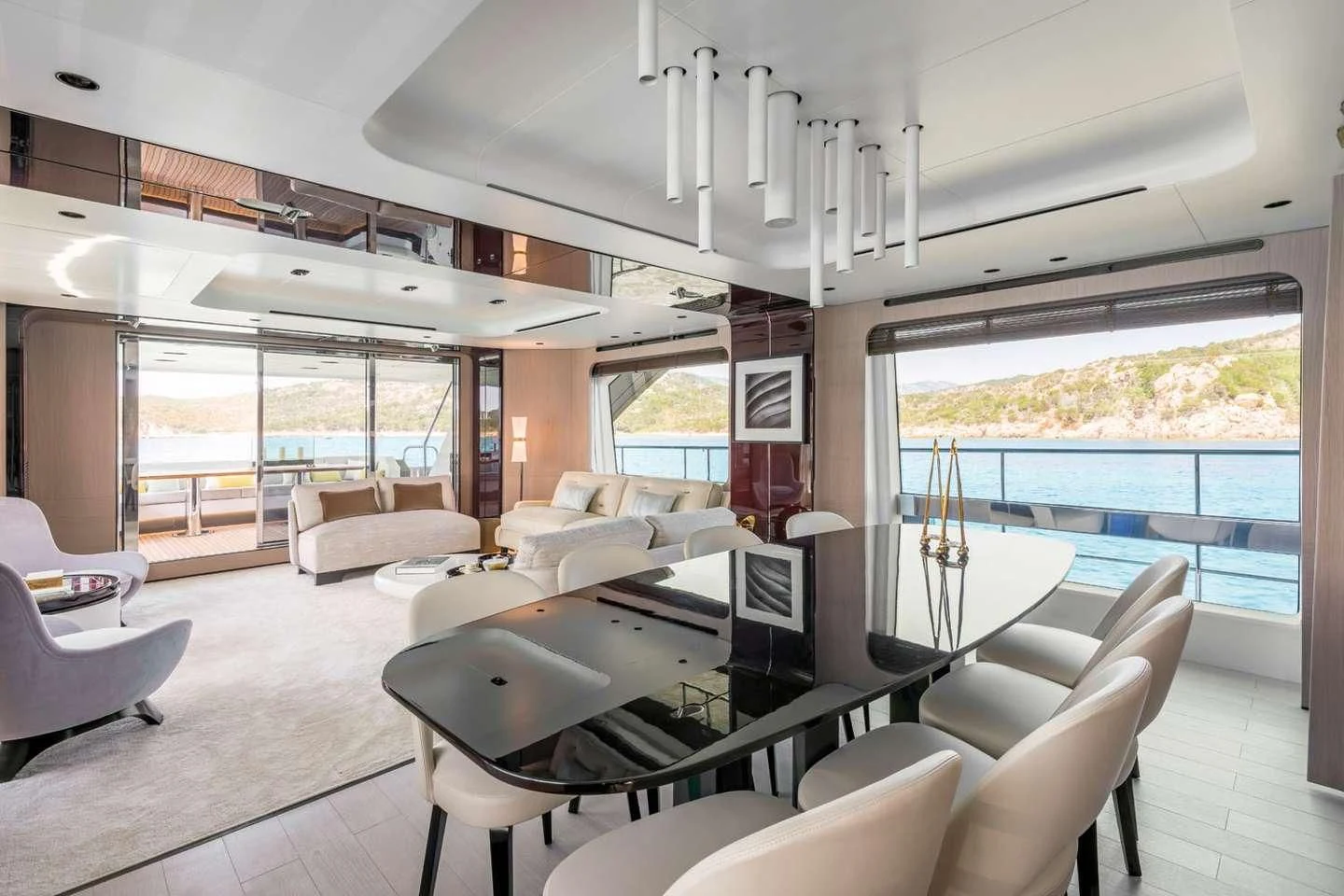 a room with a large window and a view of the ocean aboard MAREA LA NAUTICA Yacht for Sale