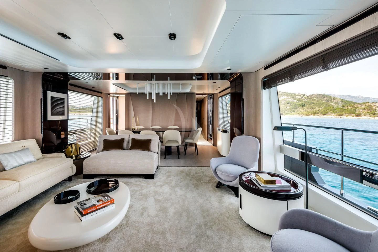 a living room with a large window aboard MAREA LA NAUTICA Yacht for Sale