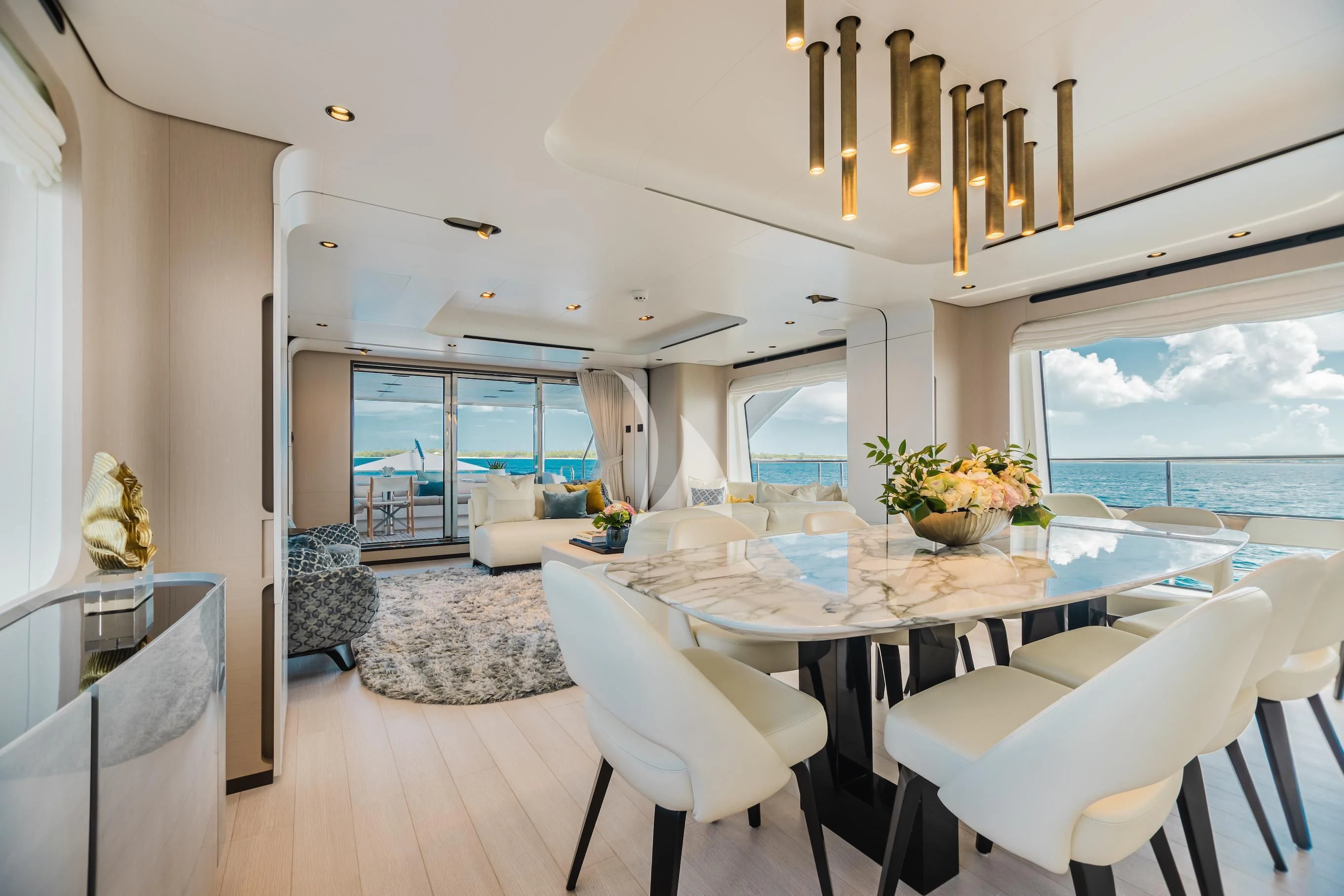 a large dining room with a large open window aboard MAREA LA NAUTICA Yacht for Sale