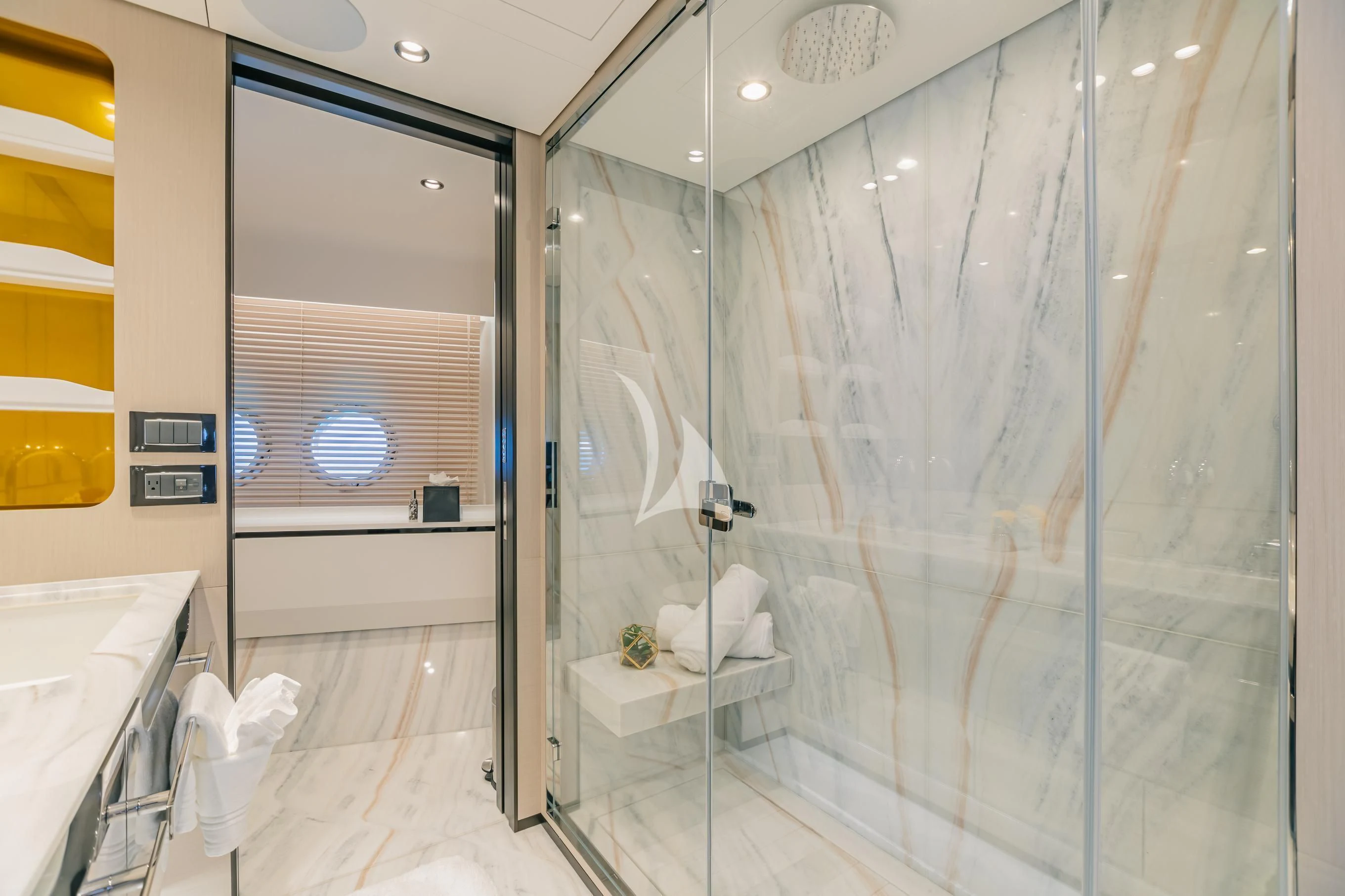 a bathroom with a glass shower aboard MAREA LA NAUTICA Yacht for Sale