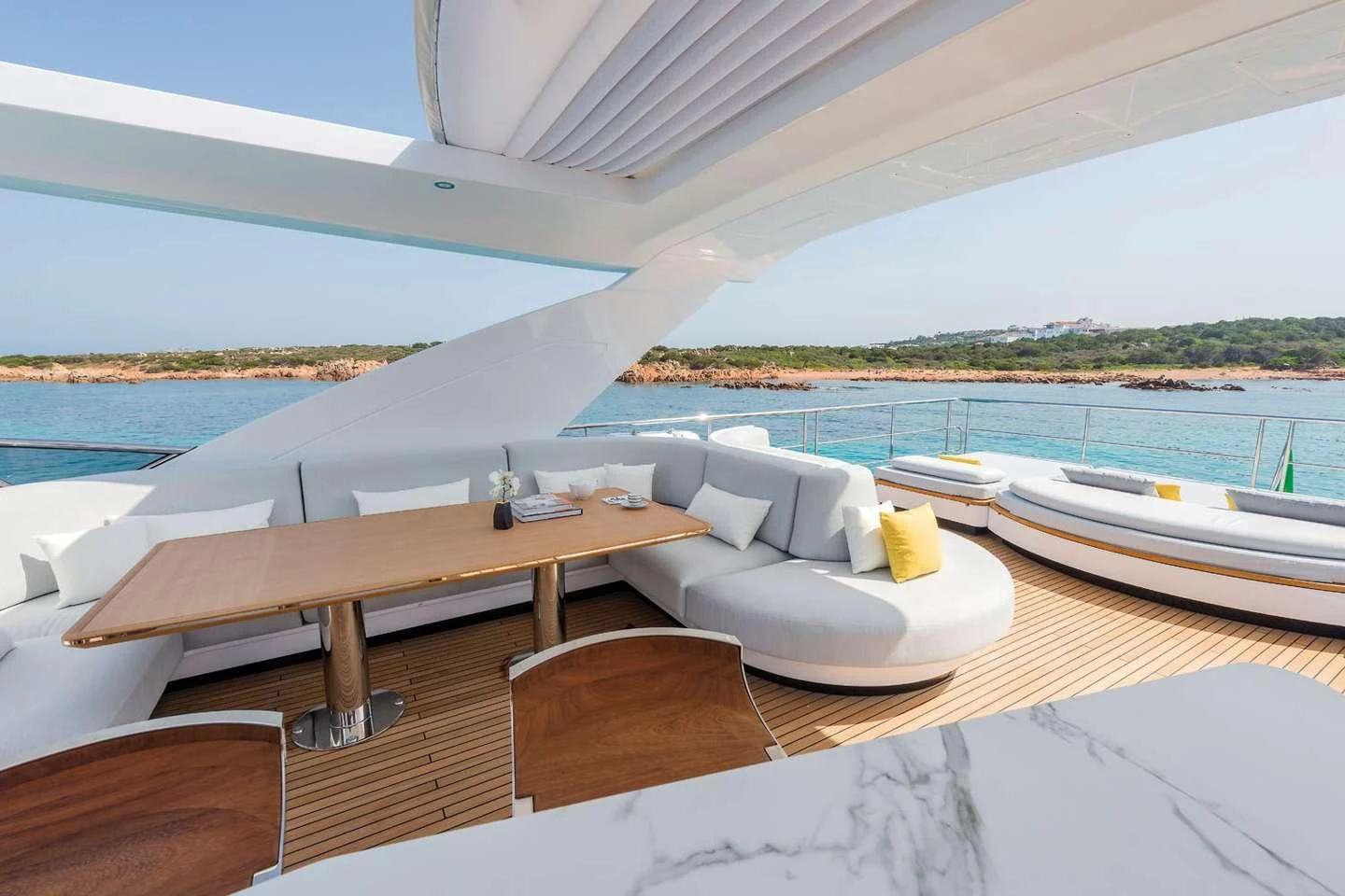 a room with a table and chairs aboard MAREA LA NAUTICA Yacht for Sale
