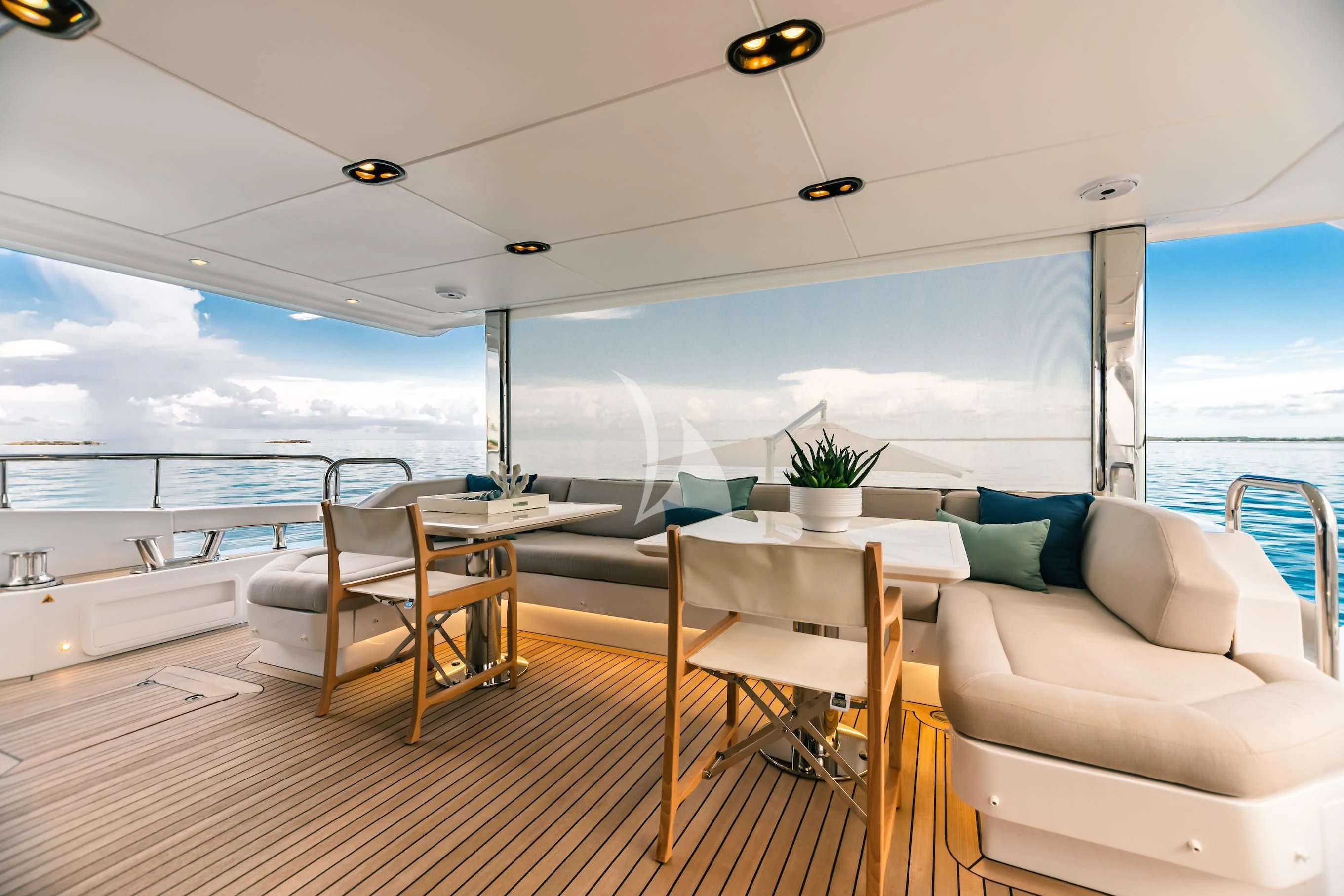 a room with a table and chairs aboard MAREA LA NAUTICA Yacht for Sale