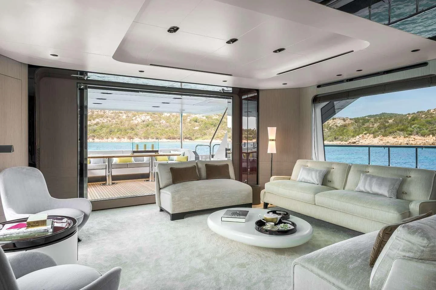 a living room with a large window aboard MAREA LA NAUTICA Yacht for Sale