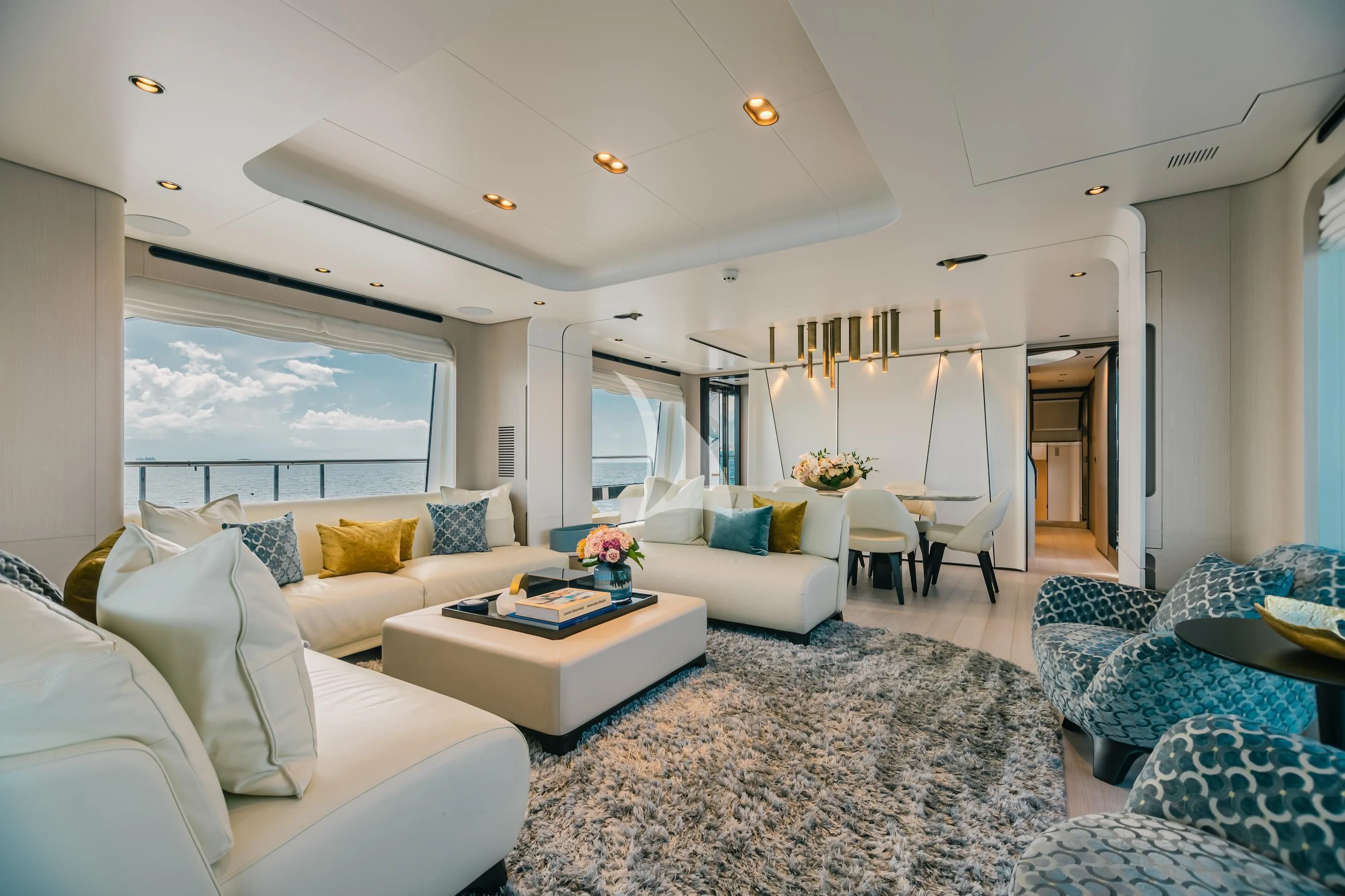 a living room with a large window aboard MAREA LA NAUTICA Yacht for Sale