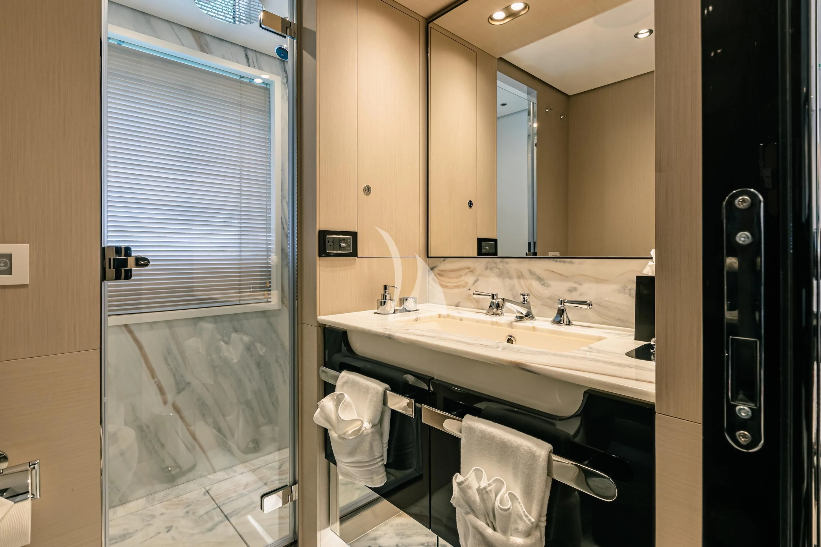 a bathroom with a sink and mirror aboard MAREA LA NAUTICA Yacht for Sale