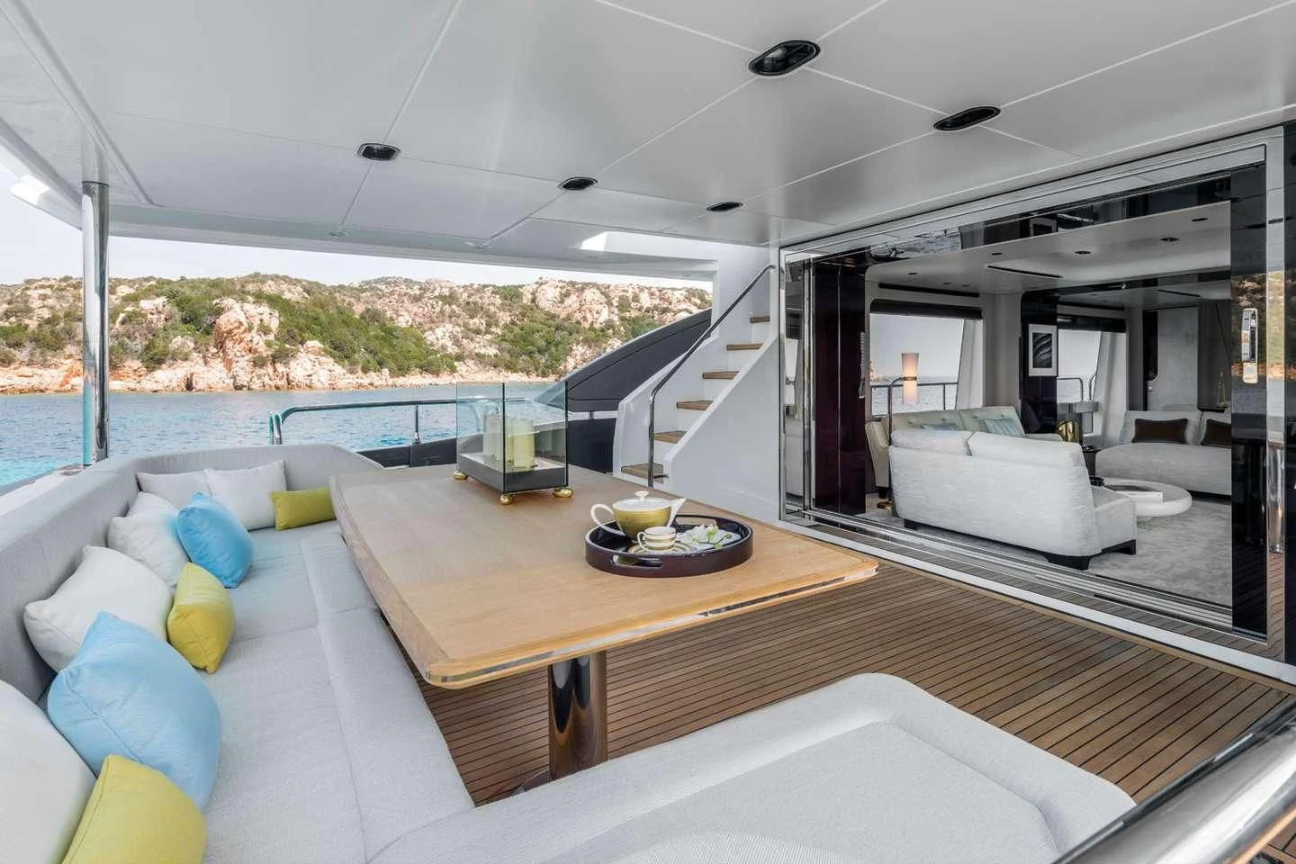 a modern living room with a large balcony aboard MAREA LA NAUTICA Yacht for Sale