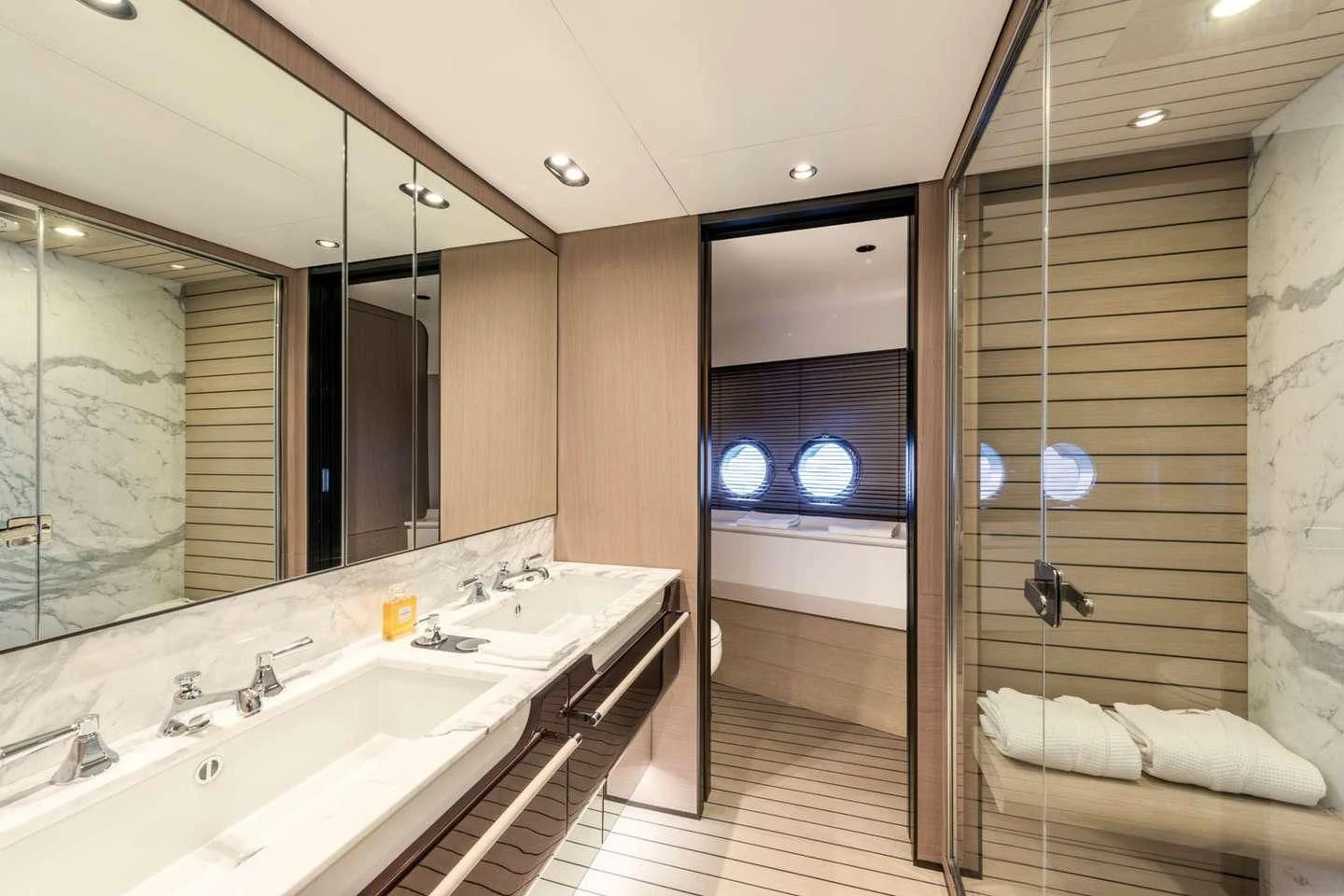 a bathroom with a large mirror aboard MAREA LA NAUTICA Yacht for Sale