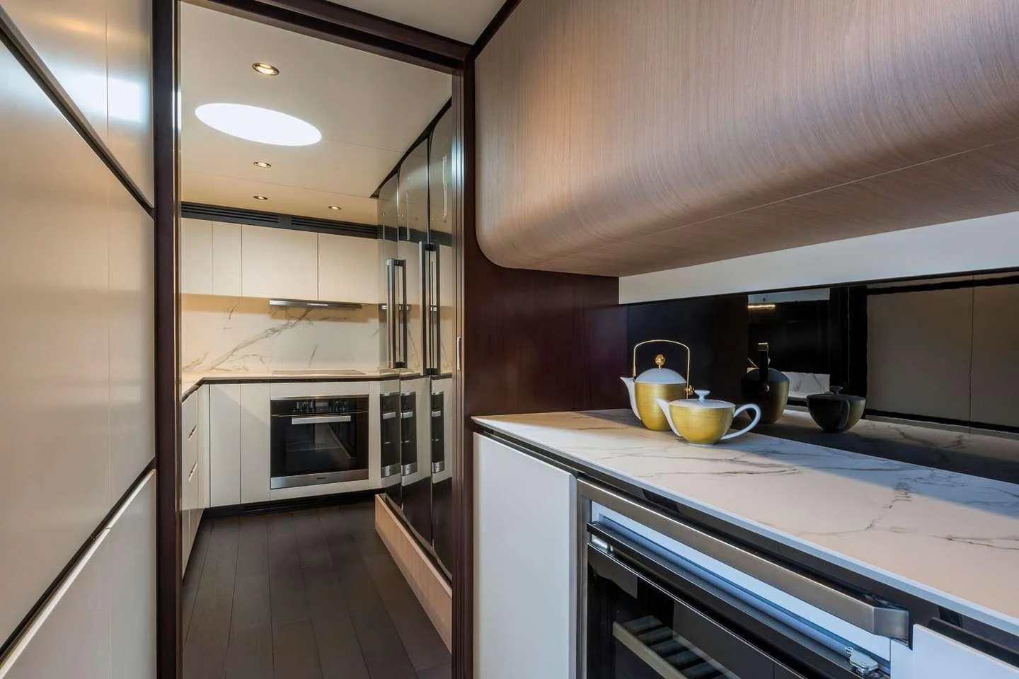 a kitchen with a glass door aboard MAREA LA NAUTICA Yacht for Sale