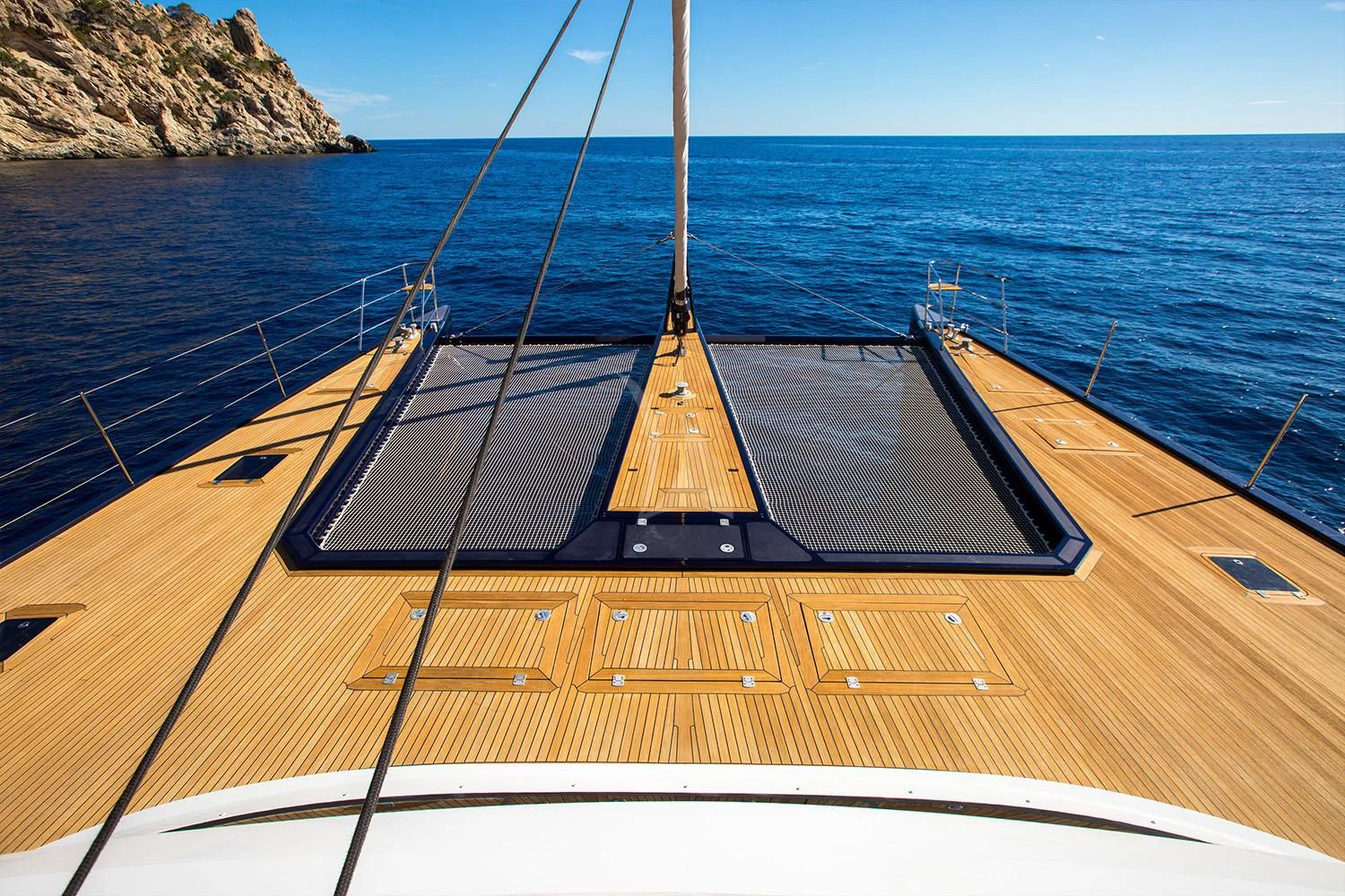a wooden boat on a dock aboard MASHUA BLUU Yacht for Sale