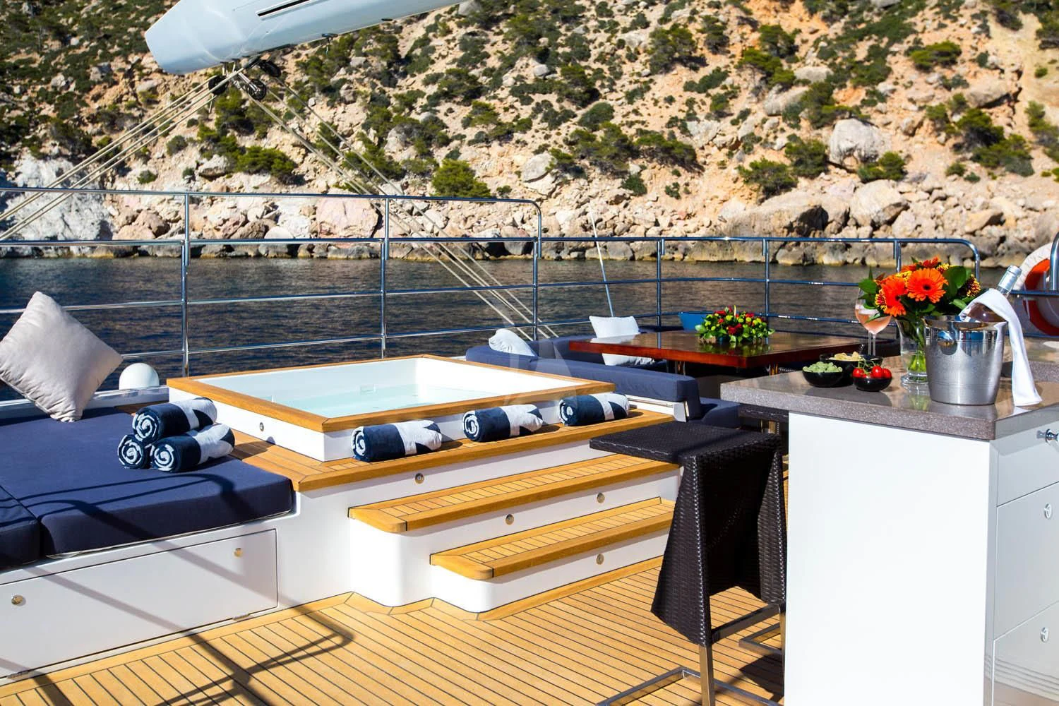 a room with a table and chairs aboard MASHUA BLUU Yacht for Sale