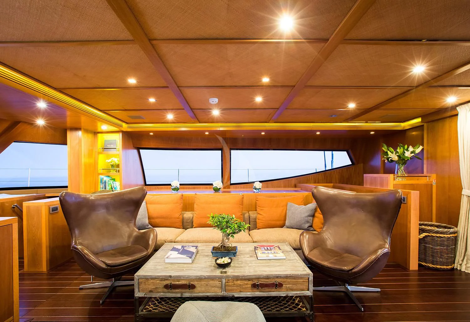 a room with a table and chairs aboard MASHUA BLUU Yacht for Sale