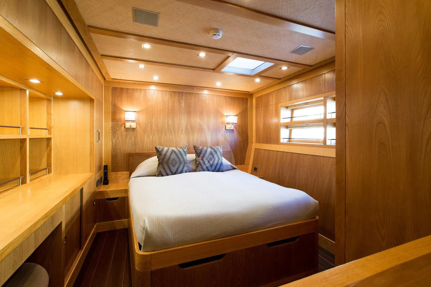 a bed in a room aboard MASHUA BLUU Yacht for Sale