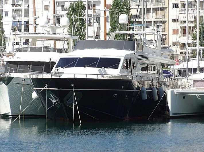 a group of boats are parked in a harbor aboard BLU SKY Yacht for Sale