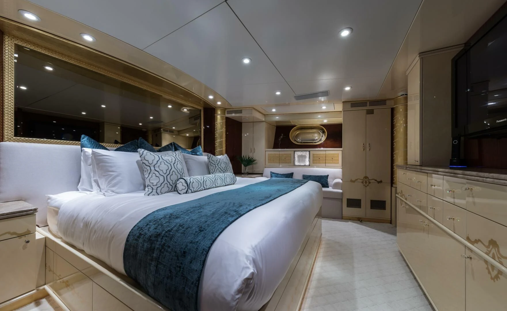 a large bed in a room aboard TOUCH Yacht for Sale