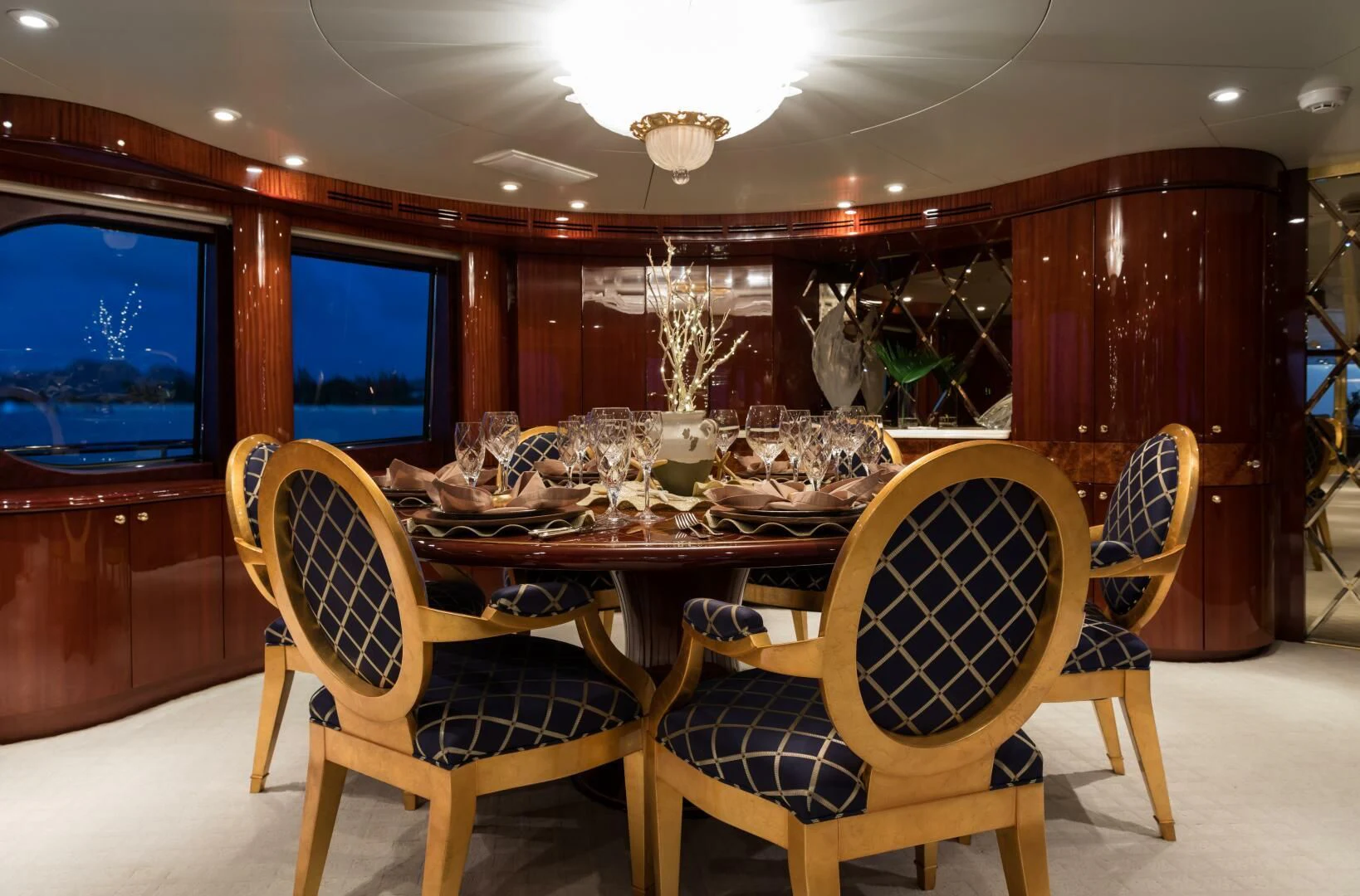 a room with a table and chairs aboard TOUCH Yacht for Sale