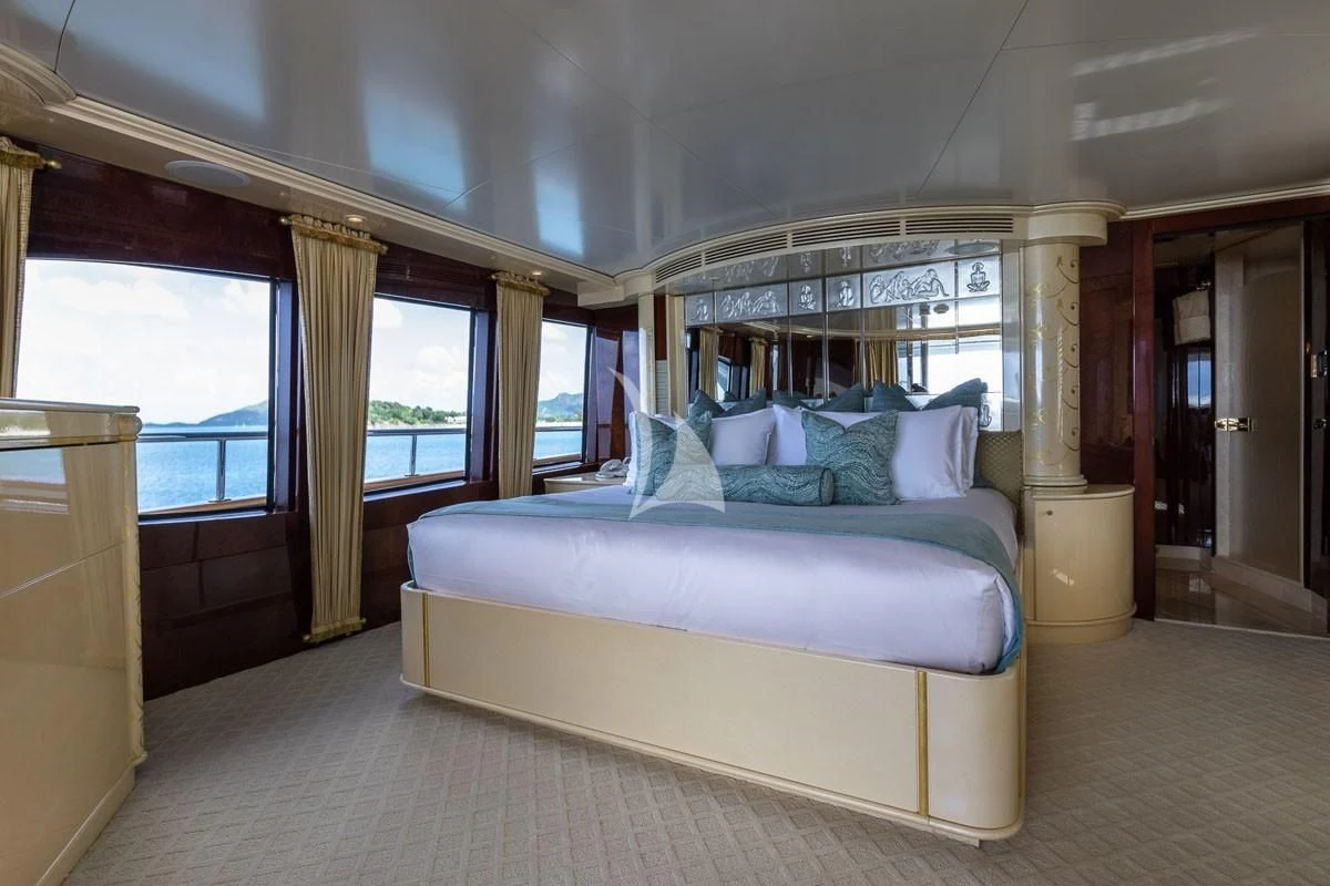 a bed in a room aboard TOUCH Yacht for Sale