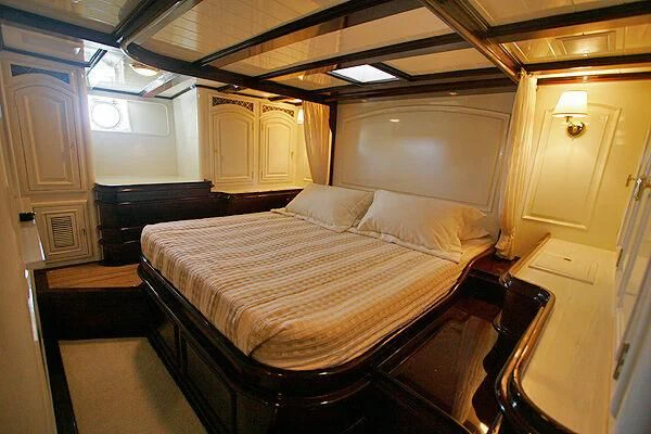 a bed in a room aboard ATREVIDA Yacht for Sale