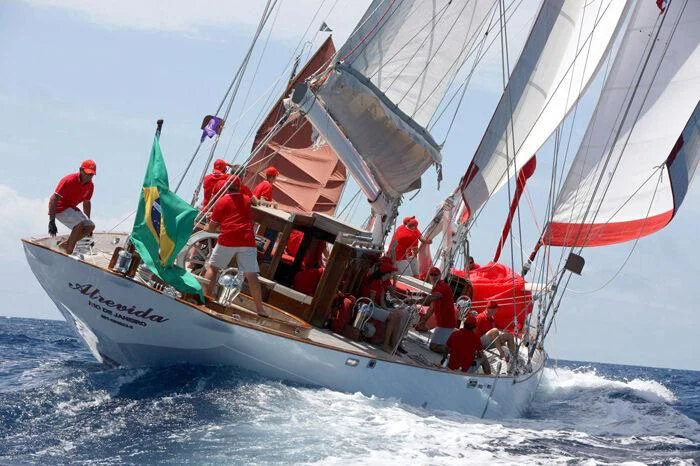 a group of people sailing on a boat aboard ATREVIDA Yacht for Sale
