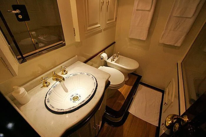 a bathroom with a sink and toilet aboard ATREVIDA Yacht for Sale