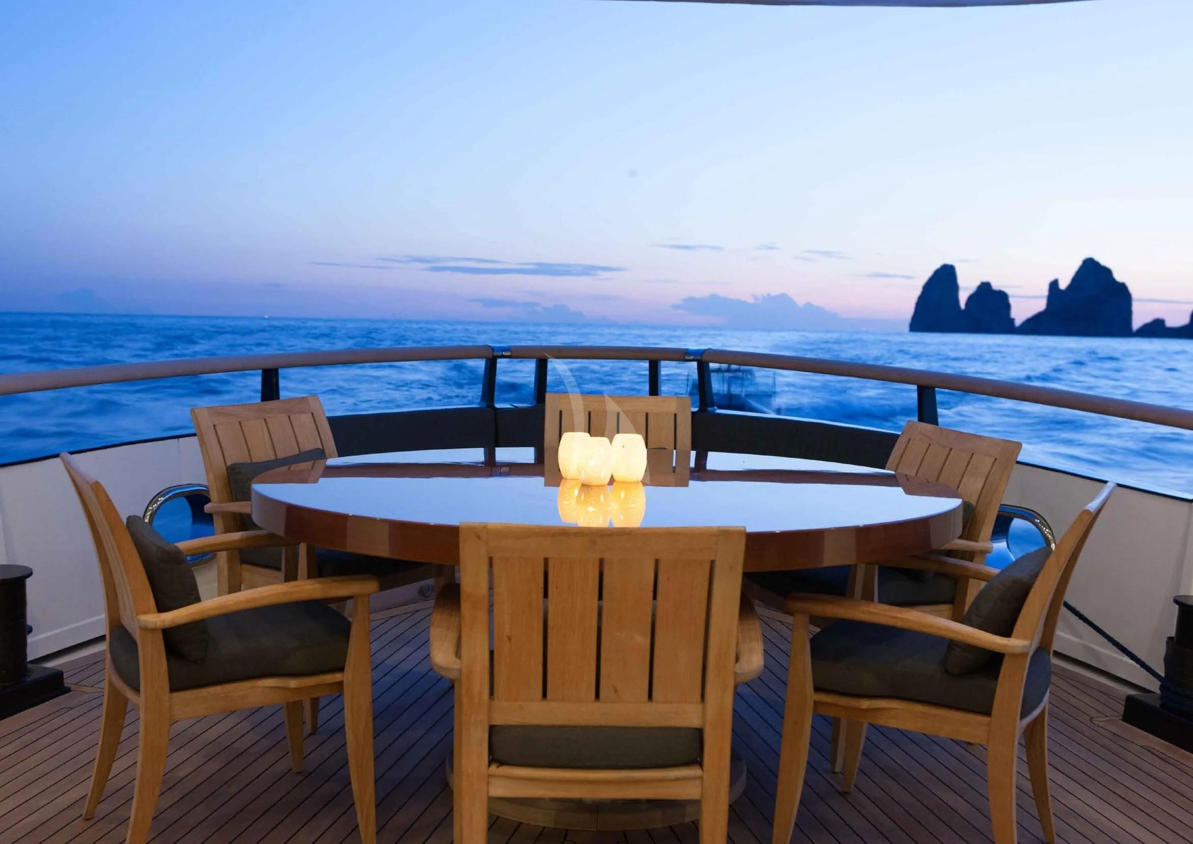 a table with glasses on it aboard ICE LADY Yacht for Sale