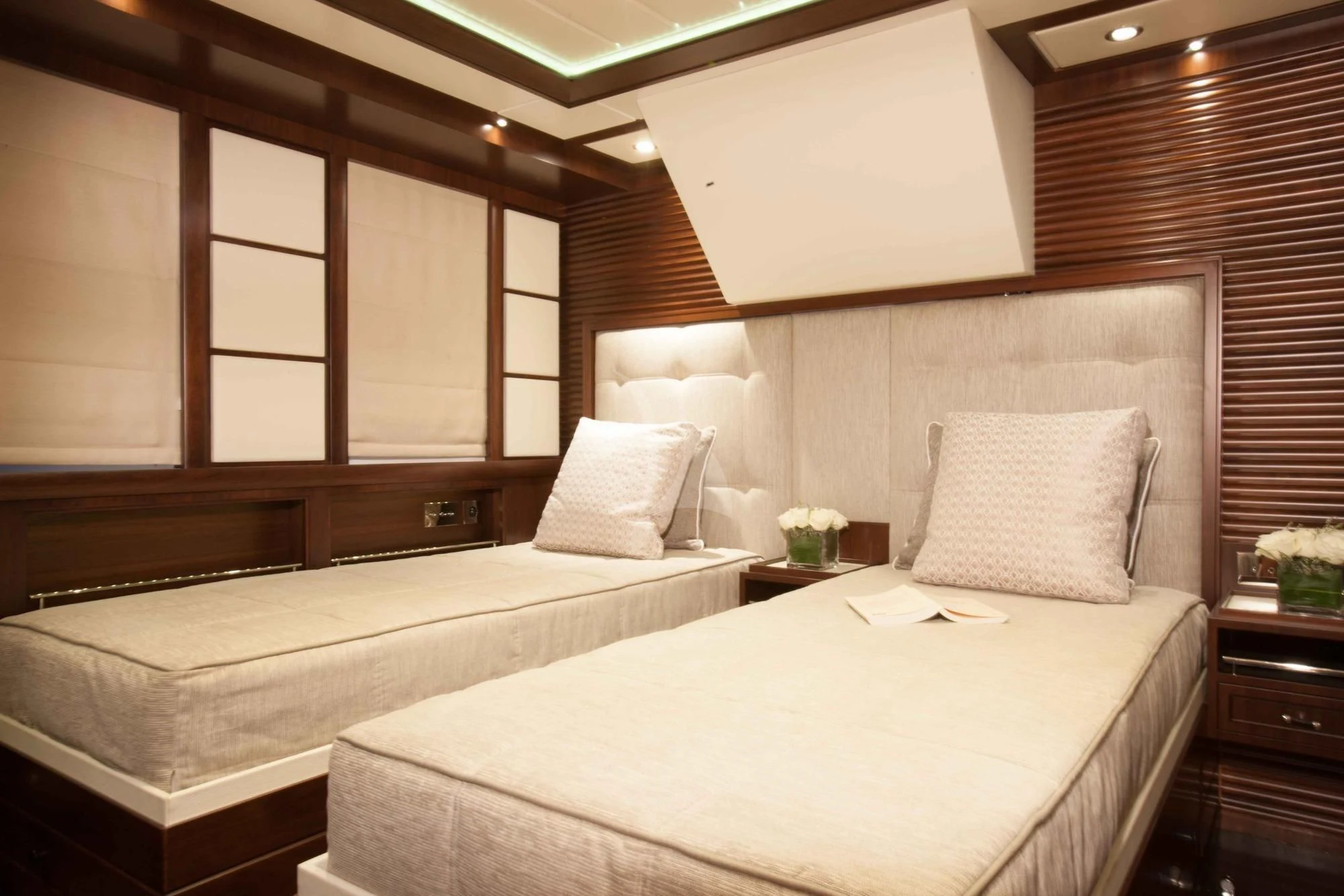 a hotel room with a bed aboard ICE LADY Yacht for Sale