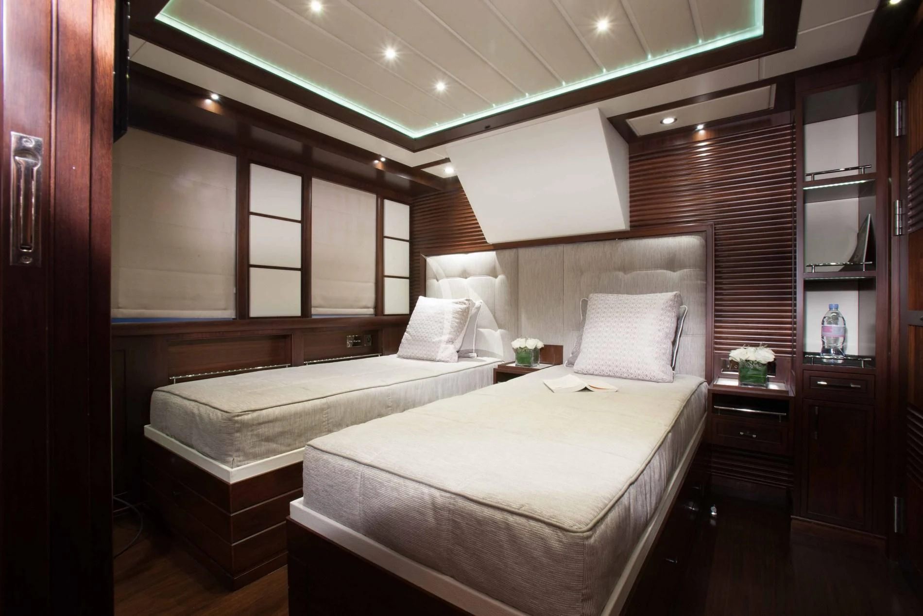 a room with two beds aboard ICE LADY Yacht for Sale