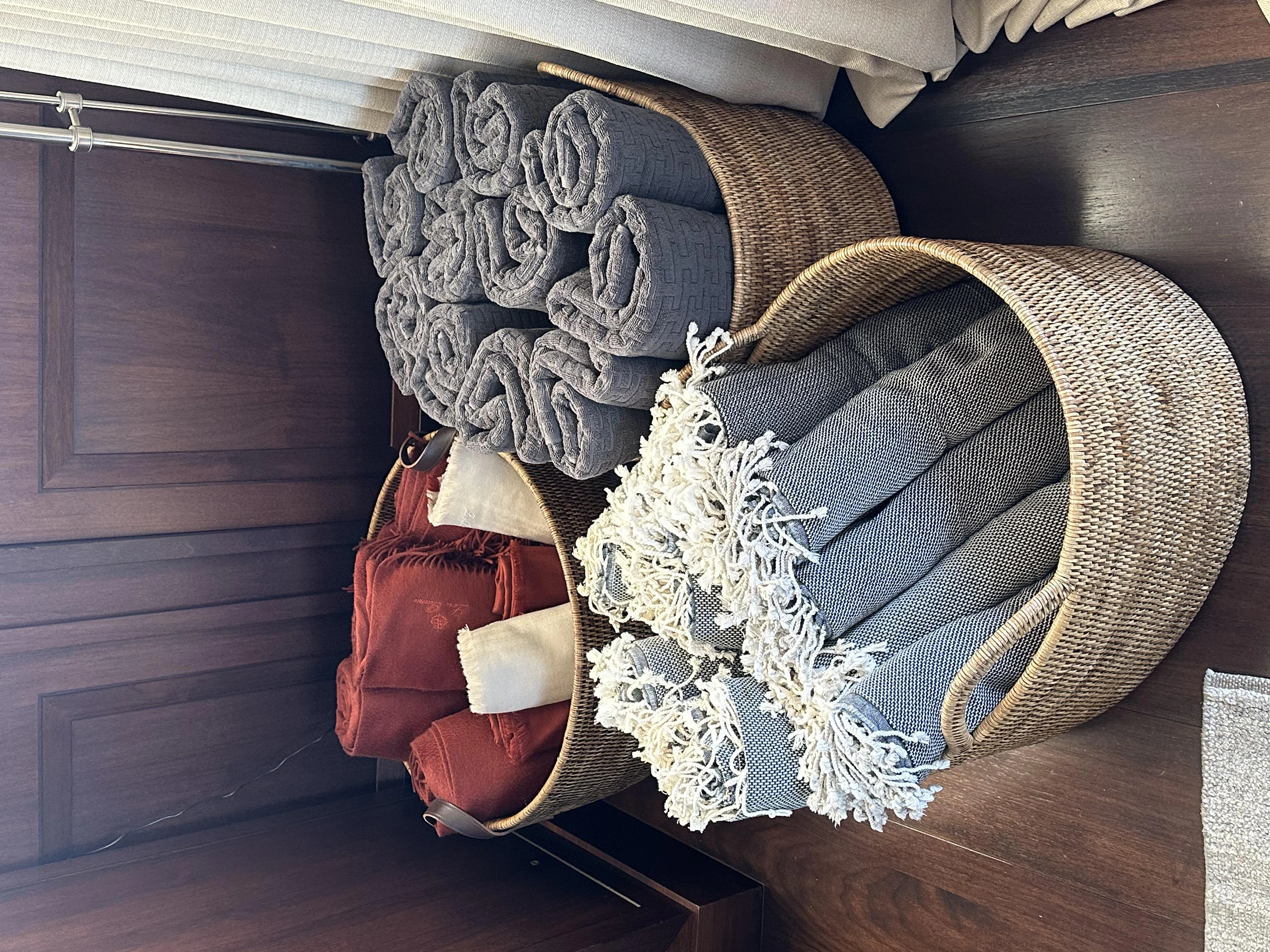 a couch with a pillow and bags on it aboard ICE LADY Yacht for Sale