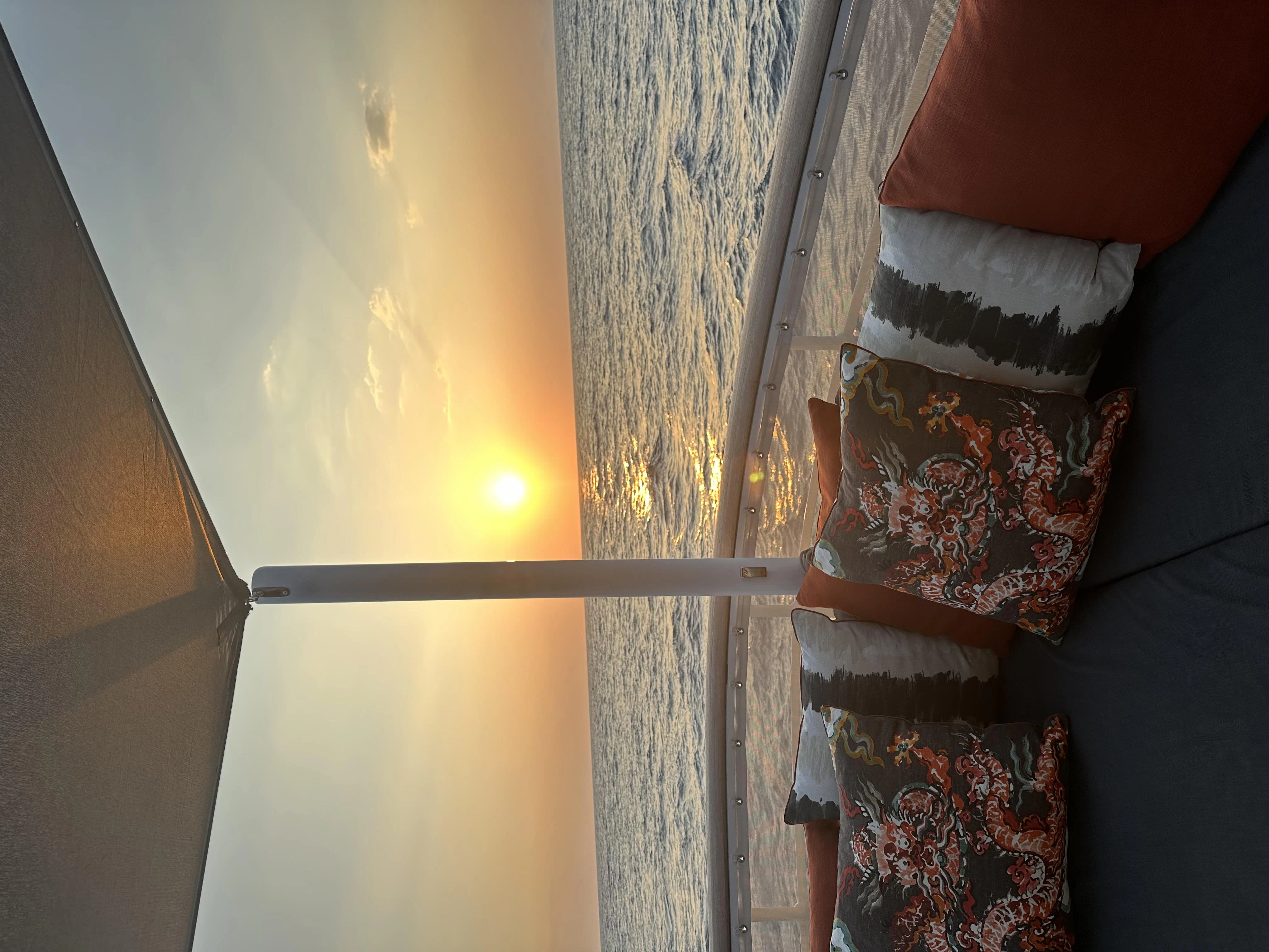 a person standing next to a window aboard ICE LADY Yacht for Sale