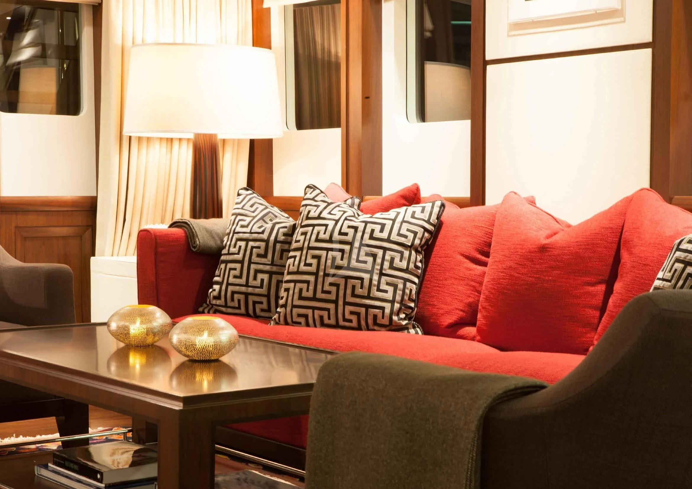 a couch with pillows and pillows aboard ICE LADY Yacht for Sale